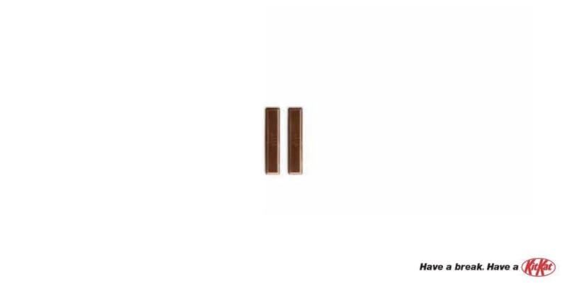 Minimalist KitKat ad showing two chocolate fingers arranged as a pause symbol with the tagline Have a break Have a KitKat